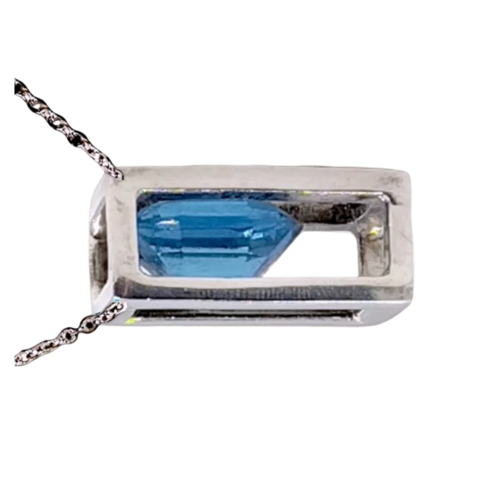 Sterling Silver Open Frame Pendant with Floating Blue Topaz on Stainless Chain